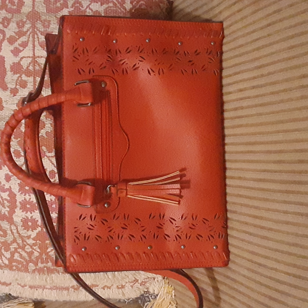 Red vegan leather bag.